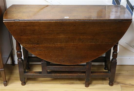 An 17th Century oak gate legged table W.105cm